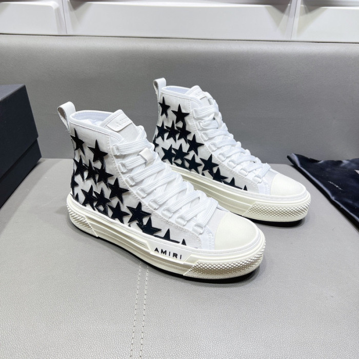 amiri* appliquéd leather and canvas sneakers